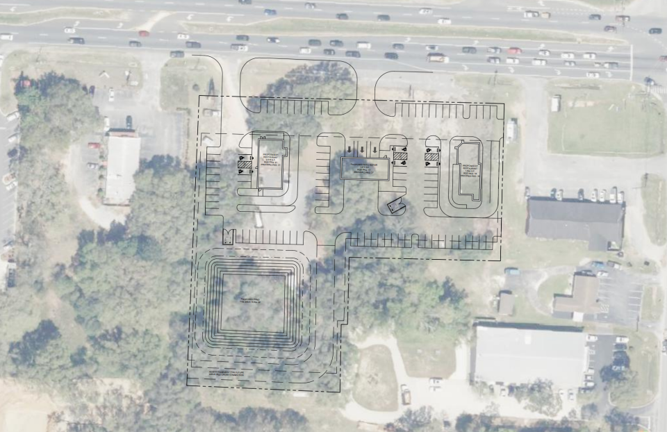 Concept plans for the potential development of a three-building project including wo restaurants with drive throughs and one automotive facility, filed with Santa Rosa County.