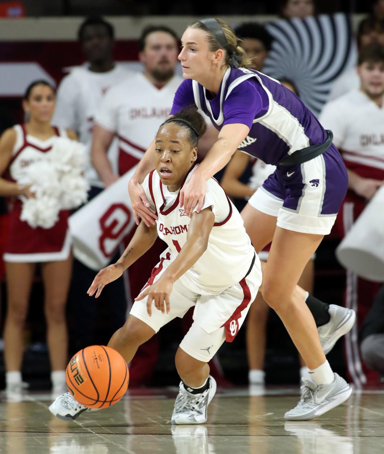 Serena Sundell fouls Nevaeh Tot in the final minute as the University of Oklahoma Sooner Women's basketball team defeats the Kansas State Wildcats 66-63 on Jan 31, 2024; Norman, Okla, [USA]; at Lloyd Noble Arena. Mandatory Credit: Steve Sisney-The Oklahoman