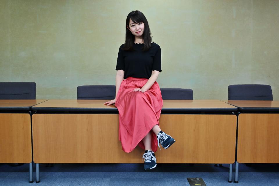 Yumi Ishikawa, leader and founder of the KuToo movement, poses after a press conference in Tokyo on June 3, 2019. - A group of Japanese women on June 3 submitted a petition to the government to protest what they say is a de-facto requirement for female staff to wear high heels at work. The online campaign #KuToo, using a pun from a Japanese word "kutsu" -- that can mean either "shoes" or "pain" --  was launched by actress and freelance writer Yumi Ishikawa and quickly won support from nearly 19,000 people online. (Photo by Charly TRIBALLEAU / AFP)        (Photo credit should read CHARLY TRIBALLEAU/AFP/Getty Images)