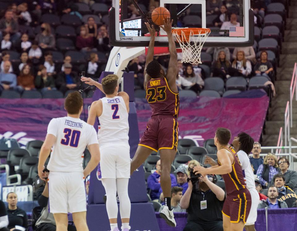 Loyola Chicago’s Chris Knight (23) goes up for a basket as the Loyola Chicago Ramblers play the University of Evansville Purple Aces at Ford Center in Evansville, Ind., Tuesday evening, Jan. 18, 2022. Loyola Chicago won 77-48.