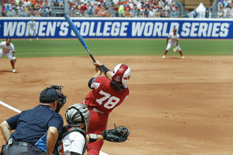 Oklahoma utility Jocelyn Alo (78) hits a home run during the first inning of an NCAA softball Women's College World Series game against Texas, Saturday, June 4, 2022, in Oklahoma City. (AP Photo/Alonzo Adams)