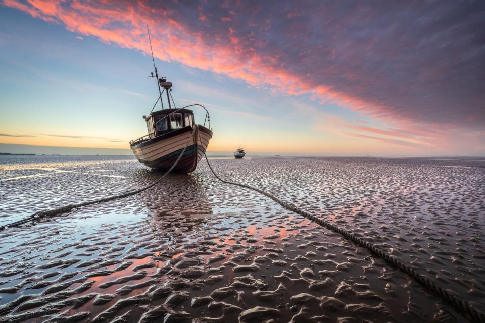 Justin Minns also won the Ships and Wrecks category with this image, ‘Scattered’, taken at Thames Estuary, Essex (Justin Minns/Shipwrecked Mariners’ Society) (PA Media)