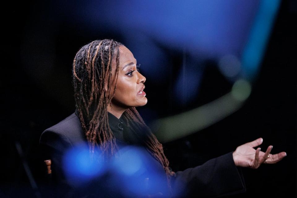 Filmmaker Ava DuVernay is pictured in conversation with the CBC’s Eli Glassner, at the TIFF Lightbox theatre, in Toronto, on Nov. 9, 2023.