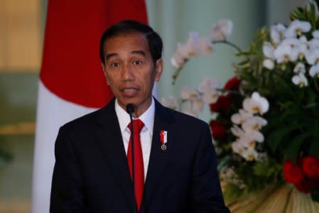 FILE PHOTO: Indonesian President Joko Widodo talks to reporters during a news conference at the Bogor Palace, West Java, Indonesia January 15, 2017. REUTERS/Beawiharta