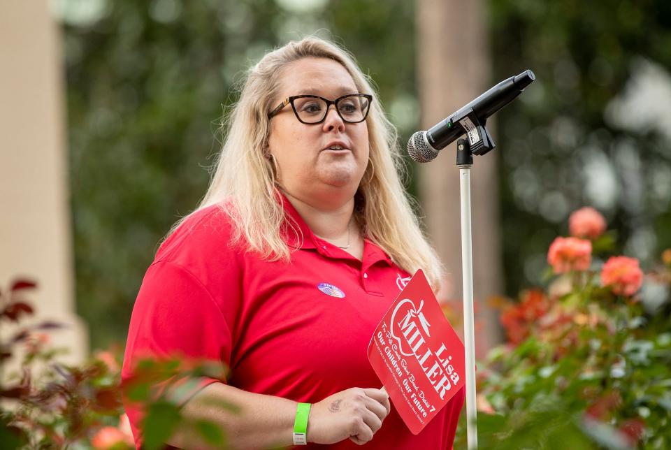 School Board candidate Lisa Miller during the Politics In The Park event in front of the Lakeland Chamber of Commerce on Lake Morton in Lakeland Fl. Tuesday August 9,  2022.  ERNST PETERS/ THE LEDGER