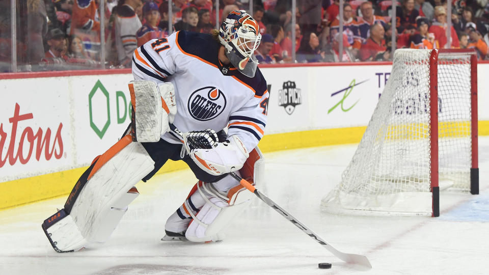 The Battle of Alberta between the Flames and Oilers didn't start the way Mike Smith would have hoped. (Candice Ward-USA TODAY Sports)