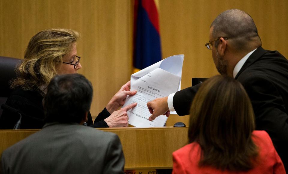 Judge Sherry Stephens and attorneys Juan Martinez, from left, Jennifer Willmott and Kirk Nurmi, go over questions submitted by jurors in the murder trial of Jodi Arias on March 6, in Maricopa County Superior Court in downtown Phoenix.
