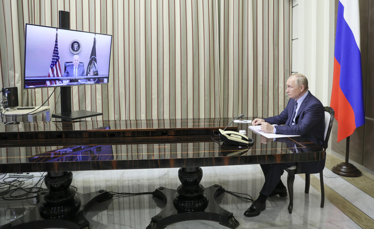 SOCHI, RUSSIA - DECEMBER 7, 2021: Russia's President Vladimir Putin (R) is seen in his office in the Bocharov Ruchei residence in Sochi during a bilateral meeting with US President Biden via a video call. Mikhail Metzel/POOL/TASS (Photo by Mikhail Metzel\TASS via Getty Images)
