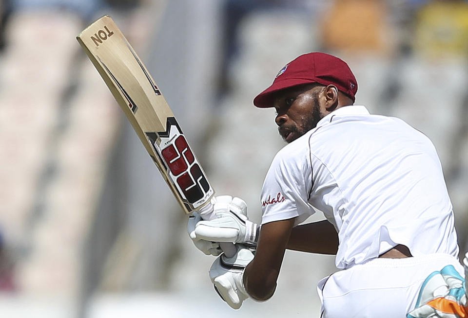 West Indies' cricket player Roston Chase bats during the first day of the second cricket test match between India and West Indies in Hyderabad, India, Friday, Oct. 12, 2018. (AP Photo/Mahesh Kumar A.)