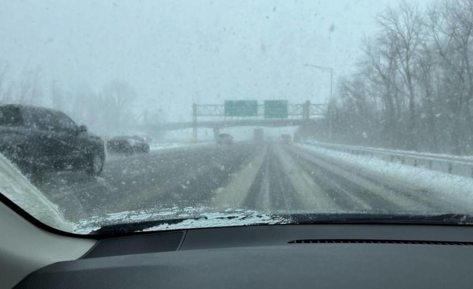 Visibility was poor on Interstate 55/70 heading east near Collinsville in the early afternoon Friday due to heavy snow, making it hard to read highway signs, including the one directing traffic to Interstate 255.