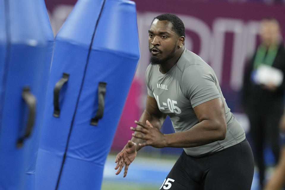 Alabama defensive lineman Justin Eboigbe runs a drill at the NFL football scouting combine, Thursday, Feb. 29, 2024, in Indianapolis. (AP Photo/Darron Cummings)