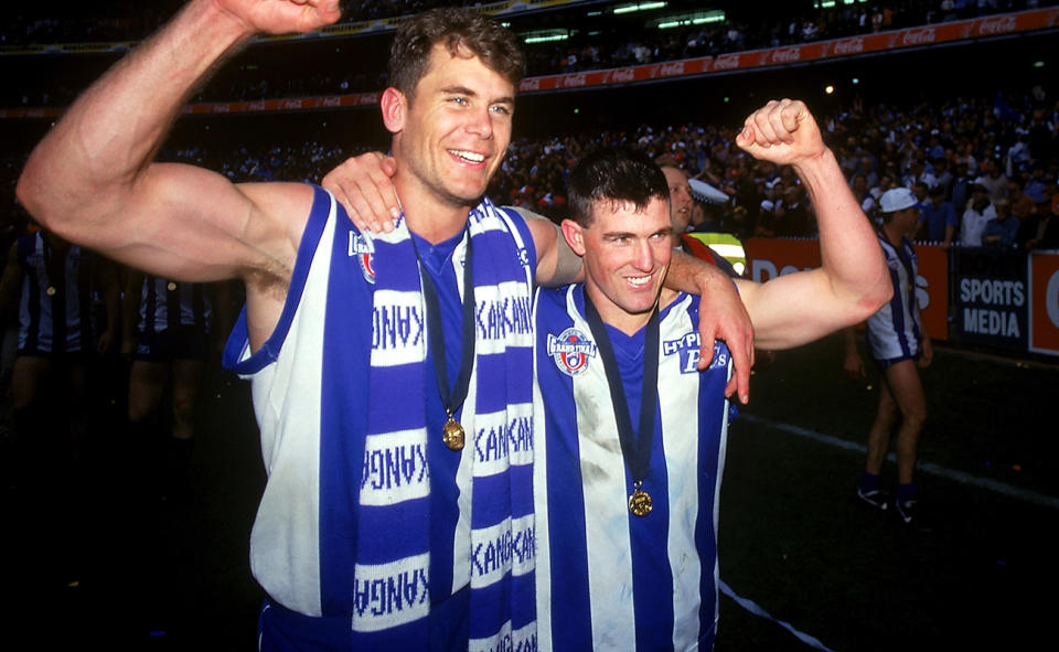 Wayne Carey and Anthony Stevens, pictured here celebrating after the 1996 grand final.