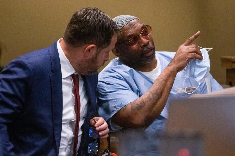 Jason Gichner, deputy director and senior legal counsel of the Tennessee Innocence Project, speaks with Artis Whitehead, who has been in jail since 2003 on charges related to the robbery of B.B. King’s in 2002, as Whitehead points to evidence being presented in court at Shelby County Criminal Court on Wednesday, September 6, 2023. The Innocence Project attorneys are arguing that Whitehead was wrongfully convicted of the crime.