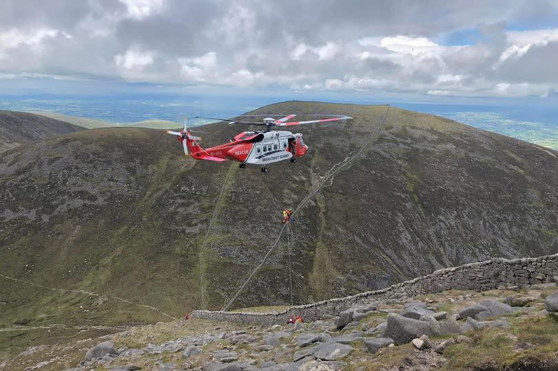 Casualty being winched to Irish Coastguard helicopter