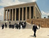 <p>Turkish Prime Minister Recep Tayyip Erdogan, right, Chief of Staff Gen. Ilker Basbug and commanders follow a guard of honor, not seen, at the mausoleum of modern Turkey’s founder Kemal Ataturk in Ankara, Turkey, Saturday, Aug. 1, 2009. Erdogan joined top commanders for military’s highest annual meetings to promote officers or dismiss others for disciplinary reasons. (AP Photo/Burhan Ozbilici) </p>