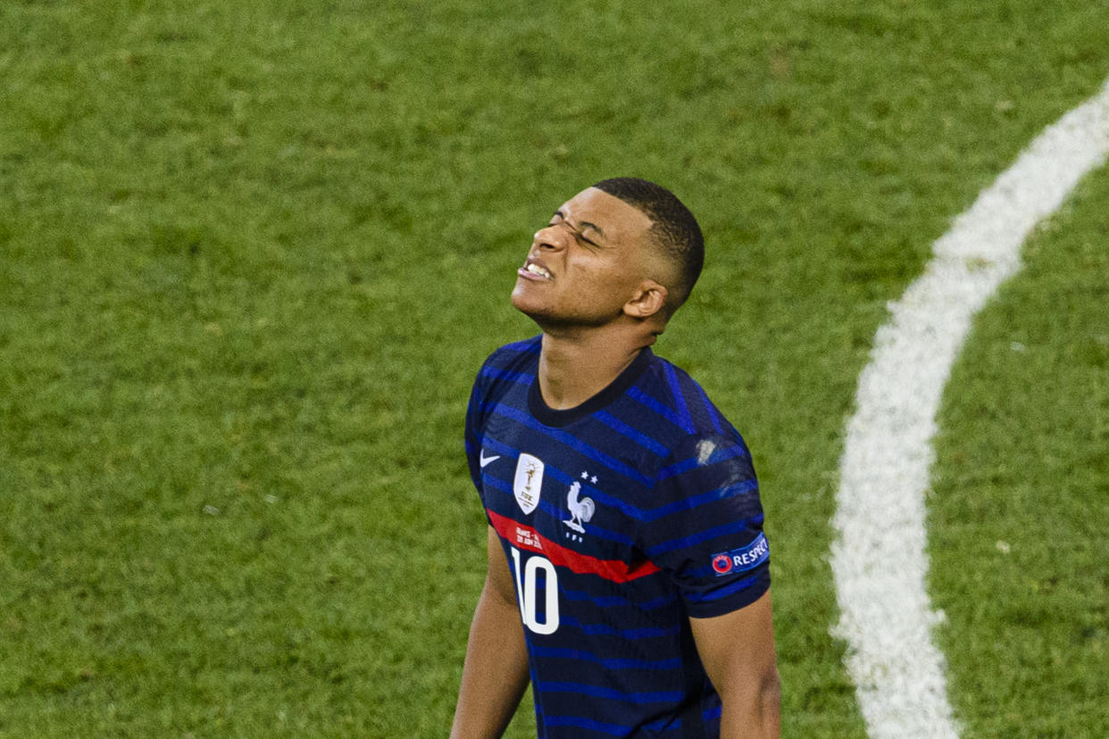 BUCHAREST, ROMANIA - JUNE 28: Kylian Mbappe of France reacts after missing a penalty shot during the UEFA Euro 2020 Championship Round of 16 match between France and Switzerland at National Arena on June 28, 2021 in Bucharest, Romania. (Photo by Marcio Machado/Getty Images)