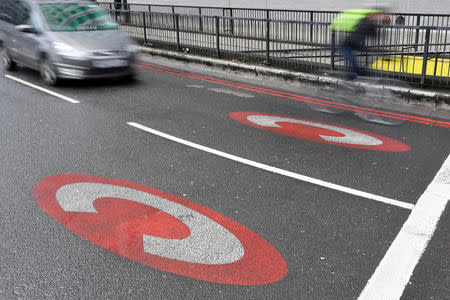 FILE PHOTO: A sign indicating the begining of the congestion charging zone in London, Britain, January 31, 2018. REUTERS/Toby Melville/File Photo