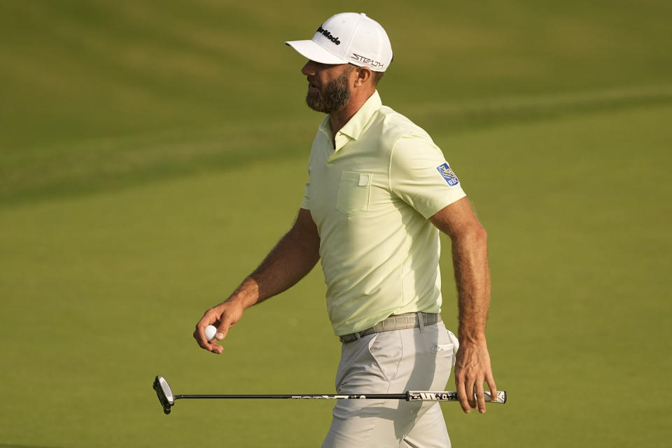 Dustin Johnson reacts after missing a putt on the 10th hole during the second round of the PGA Championship golf tournament at Southern Hills Country Club, Friday, May 20, 2022, in Tulsa, Okla. (AP Photo/Matt York)