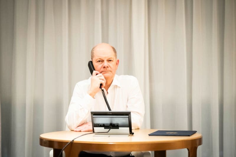 German Chancellor Olaf Scholz takes part in a conference call with the heads of state and government of the G7 countries to discuss the current situation following Iran's attack on Israel. Scholz is currently traveling in China and had to be connected from the Intercontinental Chongqing Hotel. Steffen Kugler/Bundesregierung/dpa-Pool/dpa