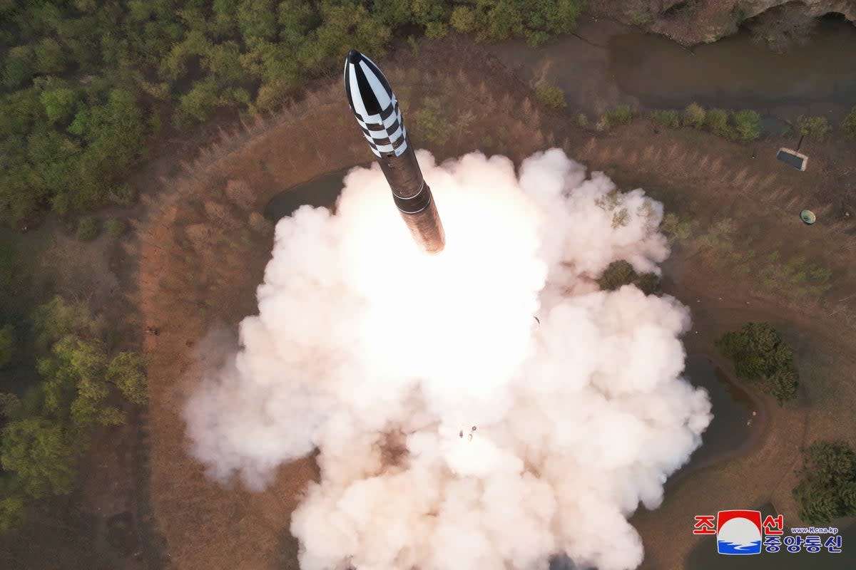 A photo released by the official North Korean Central News Agency (KCNA) shows the test firing of a new solid-fuel Hwasong-18 intercontinental ballistic missile (ICBM) (EPA)