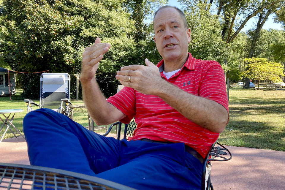 In this Oct. 20, 2021, photo Mayor of Blackstone, Va., Billy Coleburn, speaks during AP interview at his home in Blackstone, Va. Congress is requiring the Pickett name be dropped from Fort Pickett and other bases as part of a national reckoning with centuries of racial injustice, triggered most recently by the May 2020 police killing of George Floyd in Minneapolis. “There was probably a time in my life when this would have gotten me riled up,” said Coleburn, a Blackstone native who publishes the local newspaper and is mayor of the town of about 3,500 residents. “The times change,” he added. (AP Photo/Robert Burns)