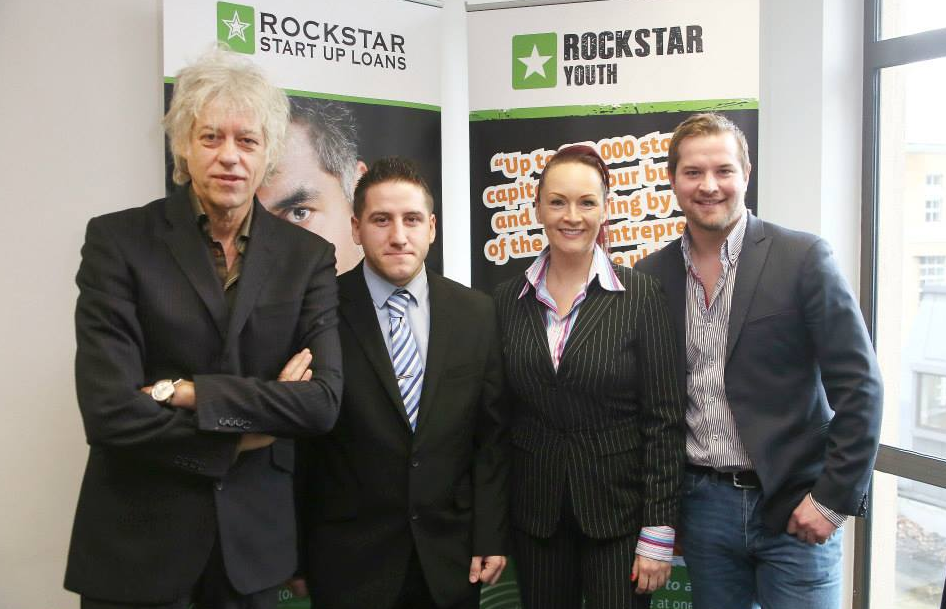 Pictured is Bob Geldof (far left) with Jon Pfahl (far right) and two others at a Rockstar event. 