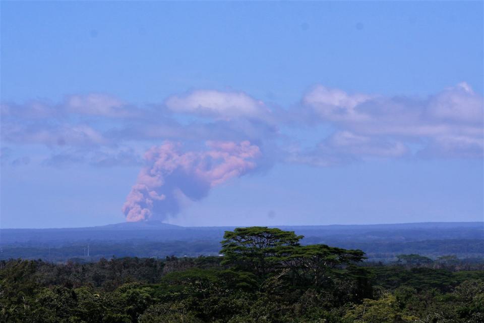 Kilauea's Pu'u 'O'o vent, seen from Hilo, began emitting plumes of smoke and gas after the crater floor collapsed.