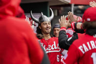 Teammates greet Cincinnati Reds' Jonathan India (6) after his solo home run during the first inning of a baseball game against the Pittsburgh Pirates, Saturday, April 1, 2023, in Cincinnati. (AP Photo/Joshua A. Bickel)