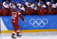 Ice Hockey - Pyeongchang 2018 Winter Olympics - Men's Quarterfinal Match - Czech Republic v U.S. - Gangneung Hockey Centre, Gangneung, South Korea - February 21, 2018 - Petr Koukal of the Czech Republic celebrates with teammates after scoring in a shootout. REUTERS/Brian Snyder