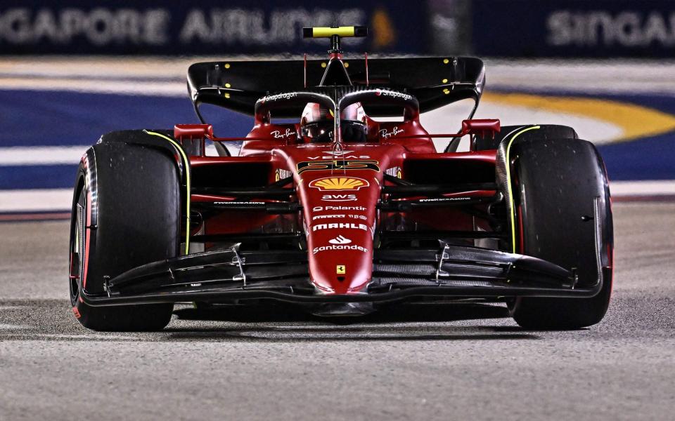 Ferrari's Spanish driver Carlos Sainz Jr drives during a practice session ahead of the Formula One Singapore Grand Prix night race at the Marina Bay Street Circuit in Singapore on September 30, 2022 - AFP