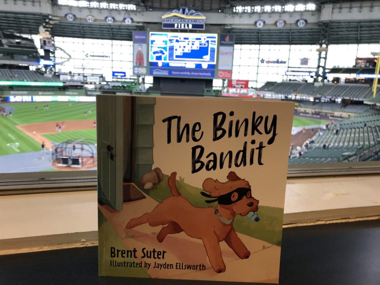 Brent Suter is not only contributing out of the Reds bullpen with a 13 1/3 inning scoreless streak, but he is contributing in the clubhouse, leaving his teammates a copy of his children's book, 'The Binky Bandit,' on Earth Day.