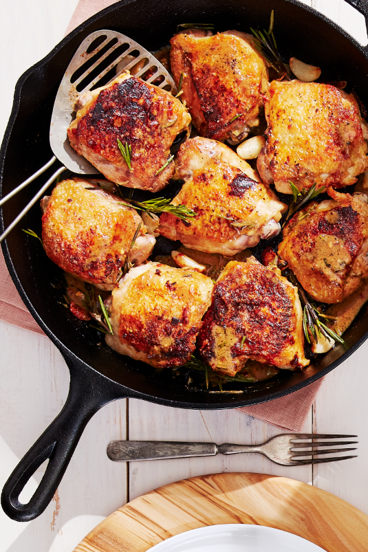 <p>What's better than a dish that comes together in one pan? One that tastes and smells good too, that's what! </p><p><strong><a href="https://www.countryliving.com/food-drinks/a28942039/crispy-chicken-thighs-with-garlic-and-rosemary-recipe/" rel="nofollow noopener" target="_blank" data-ylk="slk:Get the recipe;elm:context_link;itc:0;sec:content-canvas" class="link ">Get the recipe</a>.</strong></p><p><strong><a class="link " href="https://www.amazon.com/Seasoned-Cast-Skillet-Utopia-Kitchen/dp/B00X4WQMAS?tag=syn-yahoo-20&ascsubtag=%5Bartid%7C10063.g.35055779%5Bsrc%7Cyahoo-us" rel="nofollow noopener" target="_blank" data-ylk="slk:SHOP CAST IRON SKILLETS;elm:context_link;itc:0;sec:content-canvas">SHOP CAST IRON SKILLETS</a></strong></p>