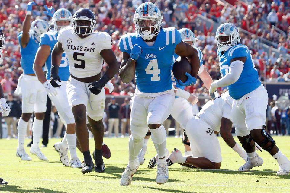 Nov 4, 2023; Oxford, Mississippi, USA; Mississippi Rebels running back Quinshon Judkins (4) runs the ball for a touchdown during the first half against the Texas A&M Aggies at Vaught-Hemingway Stadium. Mandatory Credit: Petre Thomas-USA TODAY Sports