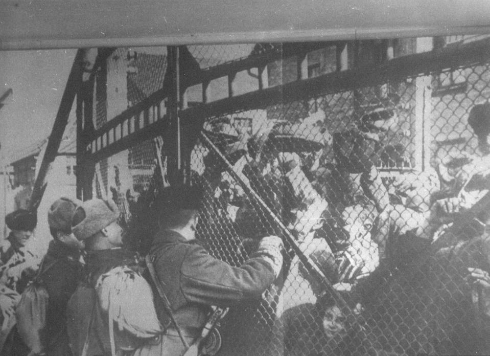 Soviet soldiers arriving at main gate of Auschwitz during liberation (REUTERS:HO AUSCHWITZ MUSEUM REUTERS).JPG