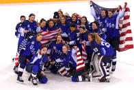 <p>The United States celebrates after defeating Canada in a shootout to win the Women’s Gold Medal Game on day thirteen of the PyeongChang 2018 Winter Olympic Games at Gangneung Hockey Centre on February 22, 2018 in Gangneung, South Korea. (Photo by Harry How/Getty Images) </p>