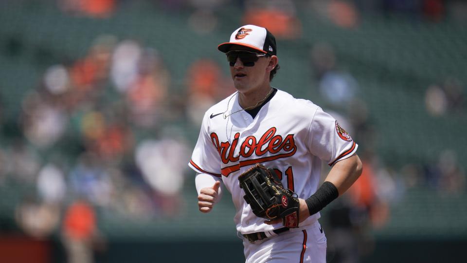 Baltimore Orioles left fielder Austin Hays heads to the dugout after the end of the top of the first inning of a baseball game against the Tampa Bay Rays, Thursday, May 20, 2021, in Baltimore. (AP Photo/Julio Cortez)