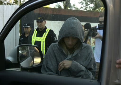 Romina Sala (C), sister of late Argentine football player Emiliano Sala, leaves her brother's wake at Club Atletico y Social San Martin in Progreso