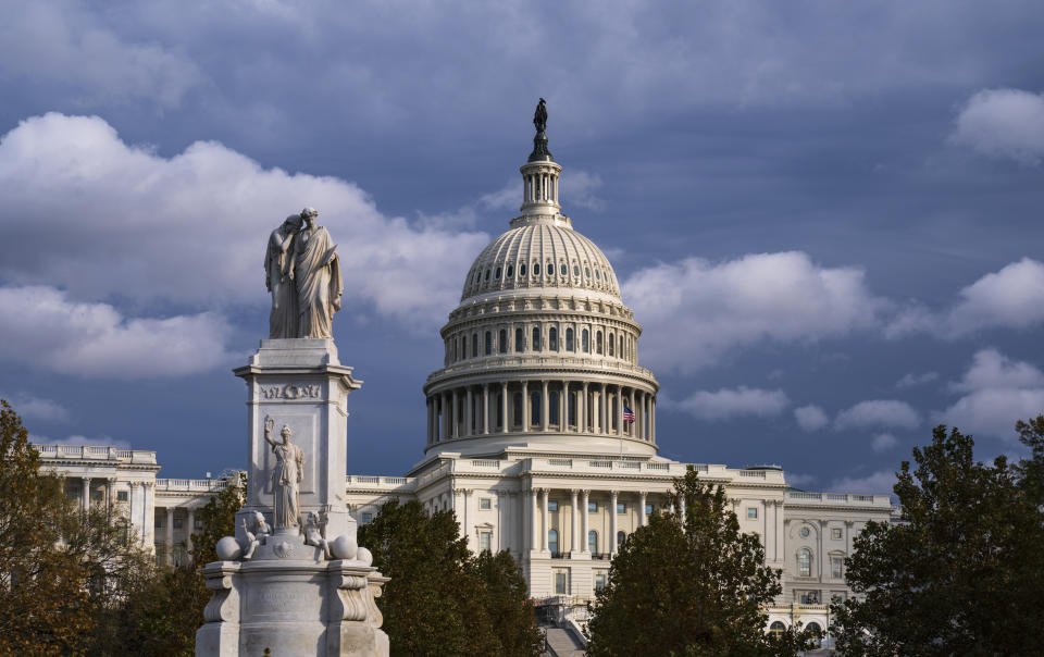 The U.S. Capitol is seen as the House is set to begin public impeachment inquiry hearings as lawmakers debate whether to remove President Donald Trump from office, in Washington, Tuesday, Nov. 12, 2019. At left is the Peace Monument. (AP Photo/J. Scott Applewhite)