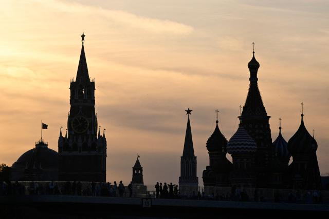 The Russian Coat Of Arms Sits On A Russian Flag Flying On The Roof Of The  Kremlin High-Res Stock Photo - Getty Images