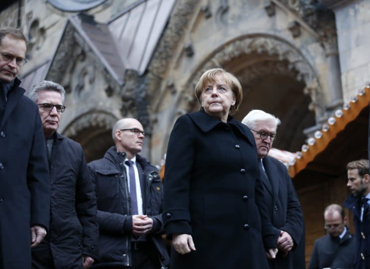 German Chancellor Angela Merkel and German Foreign Minister Fank-Walter Steinmeier walk towards the Christmas market in Berlin, Germany, December 20, 2016, one day after a truck ploughed into a crowded Christmas market in the German capital. (Photo: Hannibal Hanschke/Reuters)