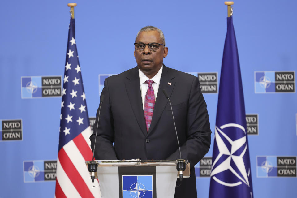 United States Secretary of Defense Lloyd Austin reads a statement following a NATO defense ministers meeting at NATO headquarters in Brussels, Wednesday, Feb. 15, 2023. (AP Photo/Olivier Matthys)