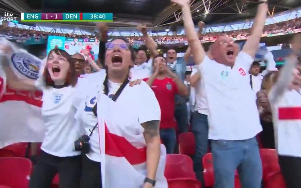 Screengrab shows Nina and her friend celebrating England's equaliser - NINA FAROOQI/ITV