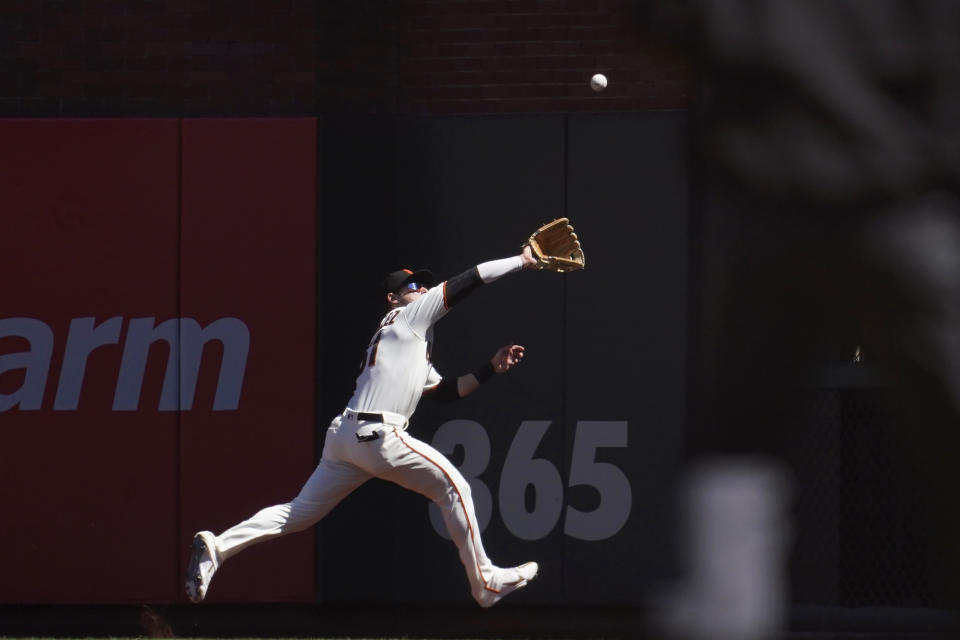 San Francisco Giants right fielder Luis Gonzalez cannot catch a double hit by San Diego Padres' Wil Myers during the sixth inning of a baseball game in San Francisco, Wednesday, Aug. 31, 2022. (AP Photo/Jeff Chiu)