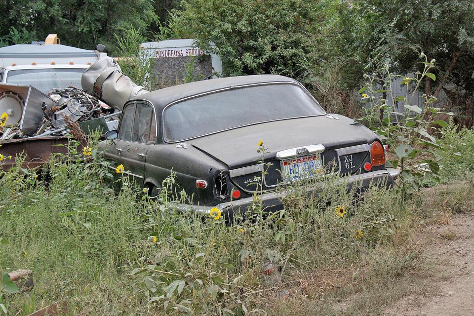 <p>Judging by the rear licence plate light, this Jaguar XJ6 is a series 2. Built between 1972 and 1977, the series 2 featured a redesigned front end, with a higher bumper and smaller grille. This was implemented to comply with US crash safety regulations, which was imperative seeing as this was its largest export market. In total, slightly more than <strong>91,227 </strong>series 2s were sold. Prominent in this photo is one of the model’s somewhat unique features: twin fuel tanks. Another car from <strong>Dakota Salvage</strong>.</p>