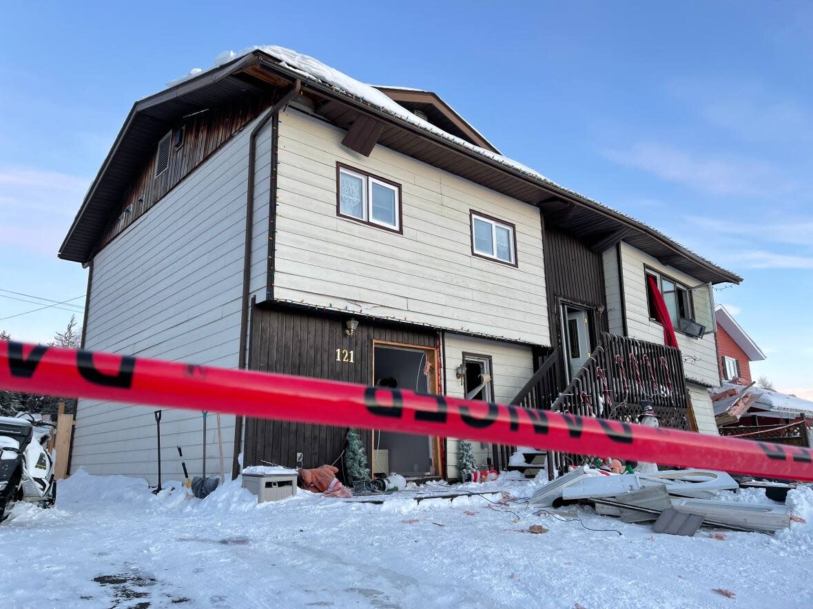 A home in Yellowknife was rocked by an explosion in the early morning hours of Dec. 6. A family of four was spared any serious injuries as the bedrooms, where they were sleeping, was the only area of the house spared by the blast. No cause has been provided by the fire marshal as of Dec. 8.  (Robert Holden/CBC - image credit)