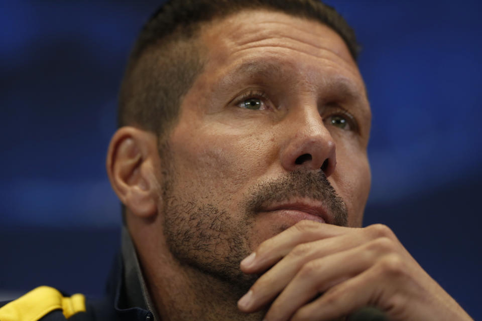 Atletico's coach Diego Simeone, of Argentina listens to a question during a press conference at the Vicente Calderon stadium, in Madrid, Spain, Monday, April 21, 2014, ahead of the Champions League semifinal first leg soccer match against Chelsea on Tuesday. (AP Photo/Andres Kudacki)