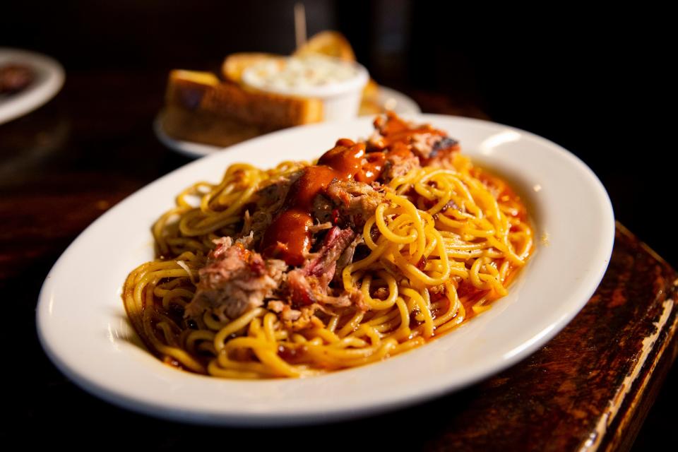 BBQ Spaghetti with toast and slaw can be seen at The Bar-B-Q Shop in Memphis, Tenn., on April 6, 2023. 