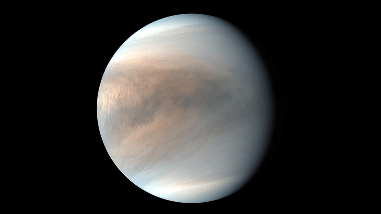  Venus is seen against the blackness of space in this photo by a spacecraft. 