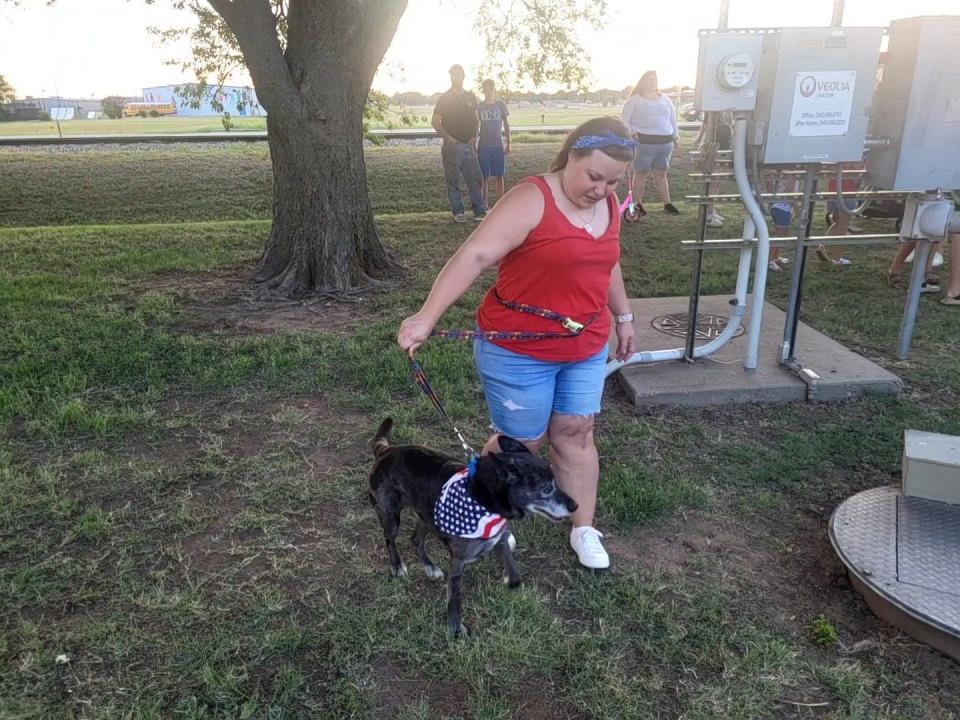 Event attendees Kim Zahn and Champ enjoy the festivities in Burkburnett.