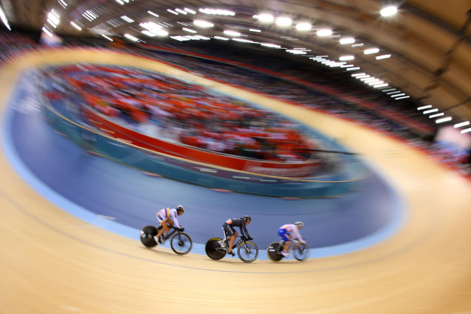 (L-R) Juliana Gaviria of Colombia, Natasha Hansen of New Zealand and Ekaterina Gnidenko of Russia compete in the Women's Sprint Track Cycling 1/16 Final Repechages on Day 9 of the London 2012 Olympic Games at Velodrome on August 5, 2012 in London, England. (Photo by Cameron Spencer/Getty Images)